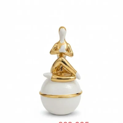 Girl in gold decorative statue