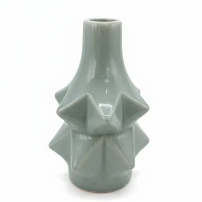 Sten-shaped ceramic candle holder