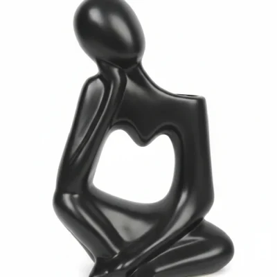 Black/ ash thinking man sculpture